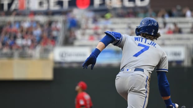 May 27, 2022; Minneapolis, Minnesota, USA; Kansas City Royals shortstop Bobby Witt (7) hits a two-run RBI triple against the Minnesota Twins during the third inning at Target Field. Mandatory Credit: Nick Wosika-USA TODAY Sports